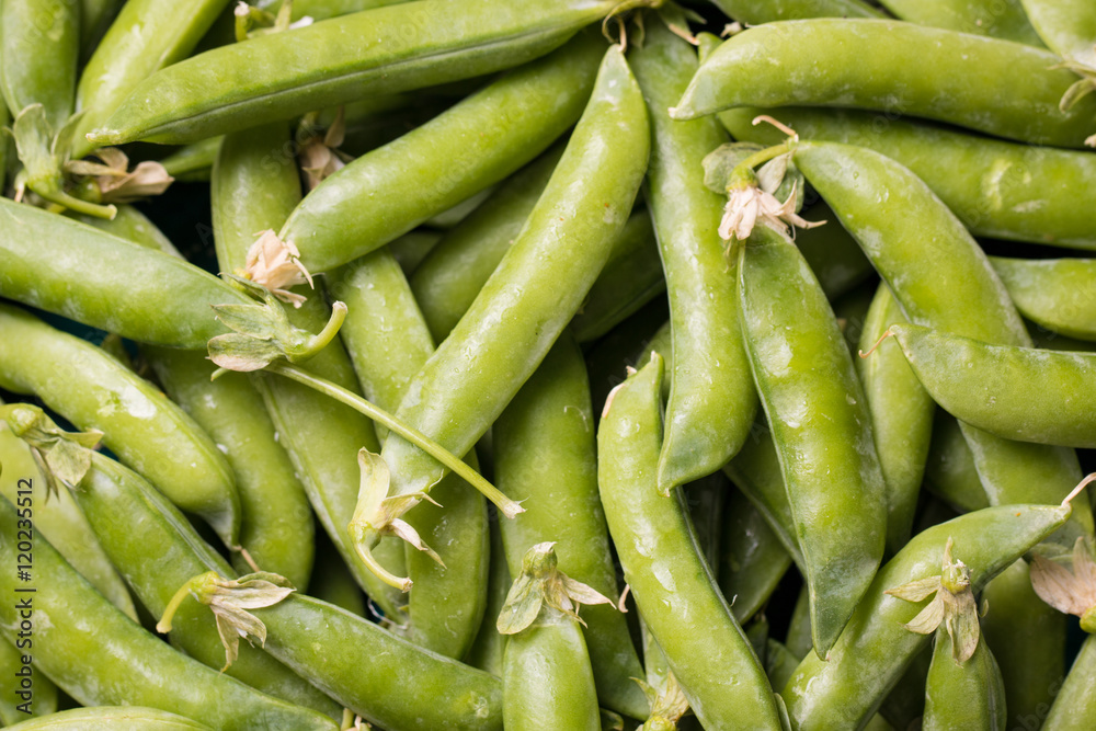 green peas on wooden table ,healthy concept green peas on wooden table ,healthy concept