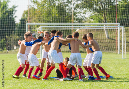 kids soccer team in huddle © Dusan Kostic