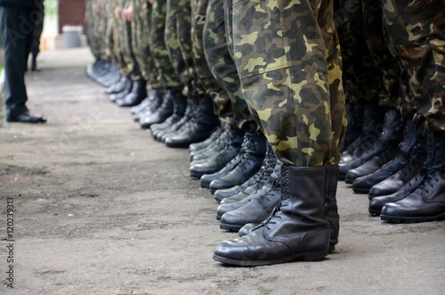 Valokuvatapetti soldiers boots in army