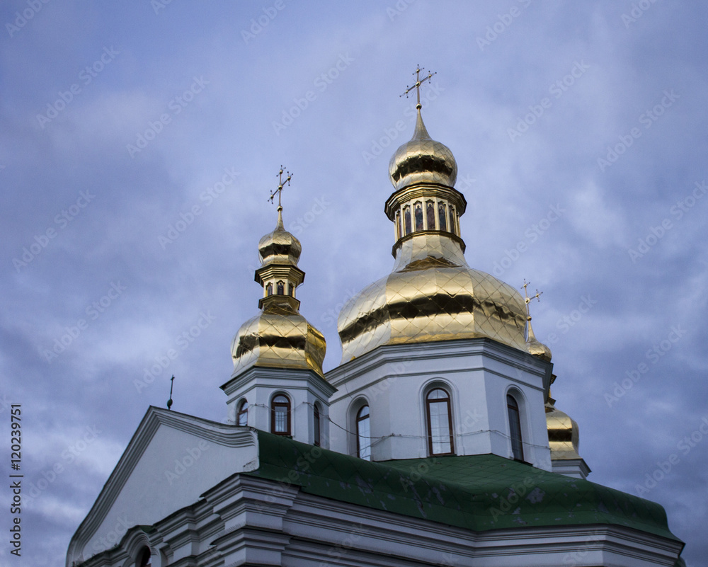 Golden domes on a background of blue sky