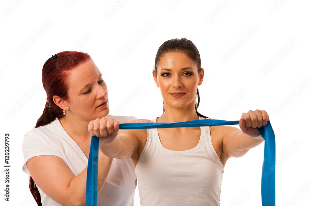 Physiotherapy - therapist doing arm strenghteninh excercises wit Physiotherapy - therapist doing arm strenghteninh excercises wit