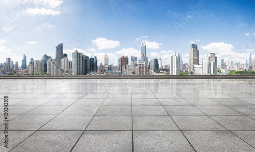 Canvas Print cityscape and skyline of shanghai from empty brick floor