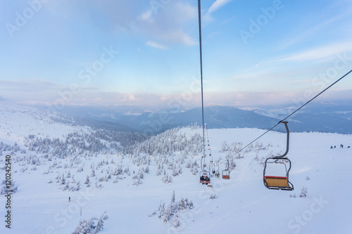 Winter mountains panorama with ski slopes and ski lifts © Ryzhkov Oleksandr