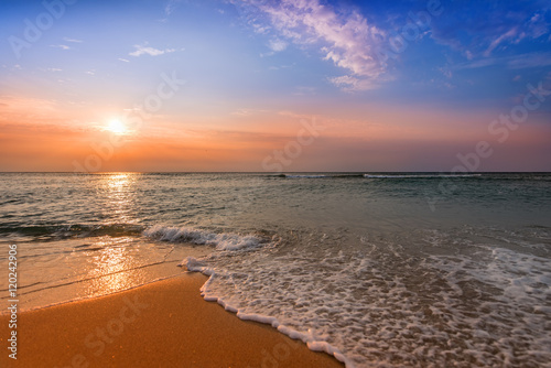 Brilliant ocean beach sunrise.