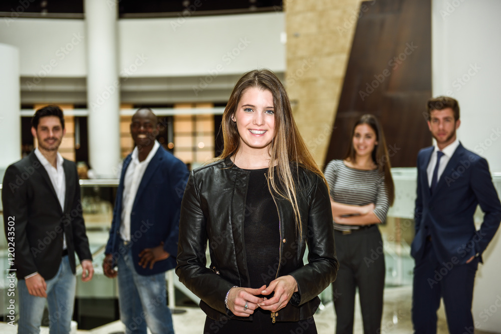 Obraz premium Businesswoman leader looking at camera in working environment.