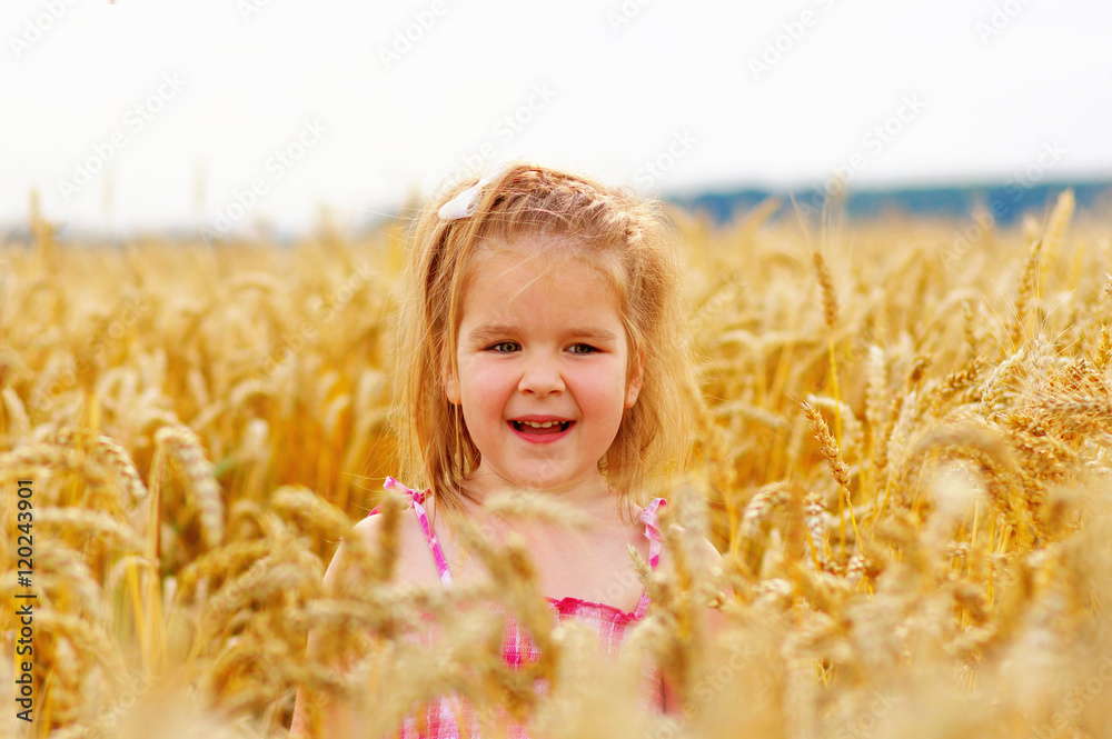 Girl on a wheat field