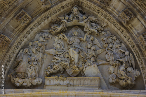 High-relief tympanum of a Gothic cathedral, Seville, Spain