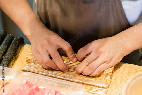 Chef Preparing Sushi
