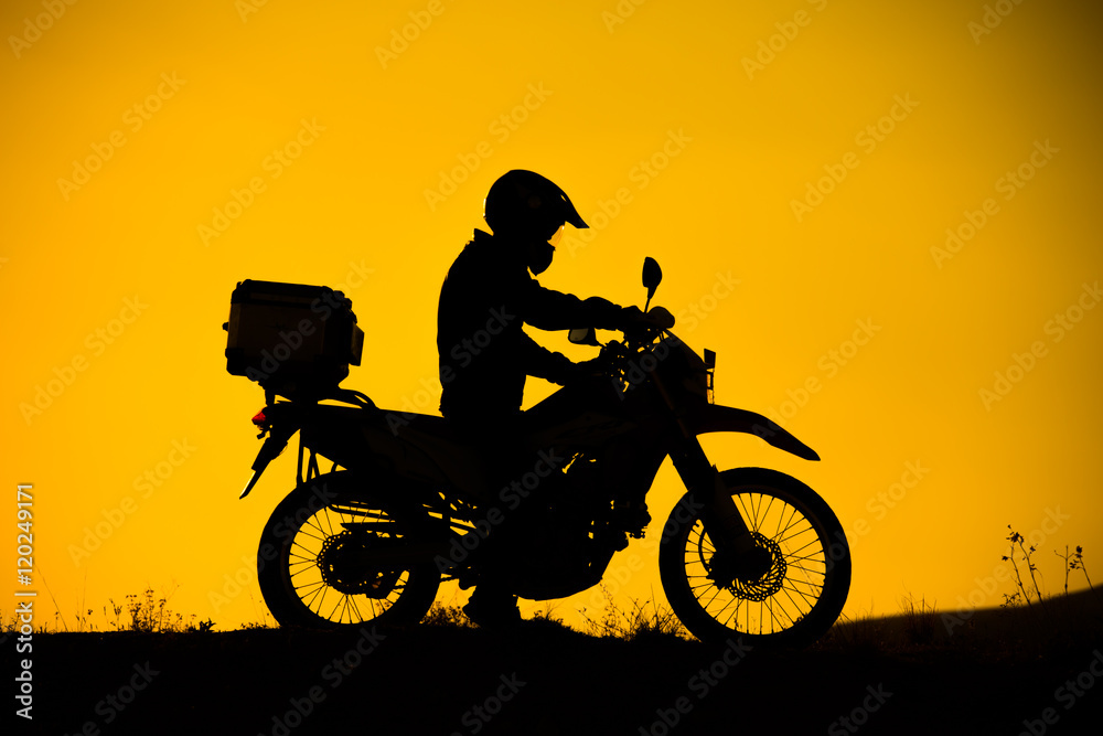 Fototapeta premium silhouette of the mountain motor drive