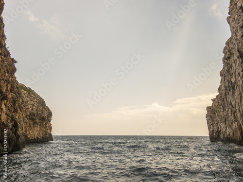 salento coast, rocky cliff in apulia, south italy