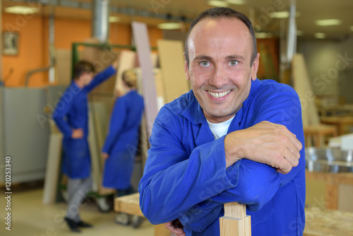 carpenter posing in workshop