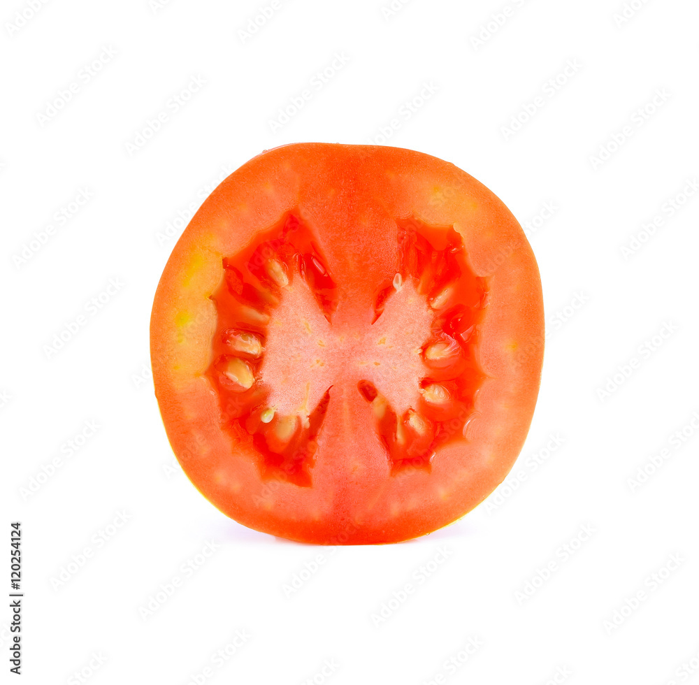 A half of fresh tomato with drops isolated on white background. A half of fresh tomato with drops isolated on white background.