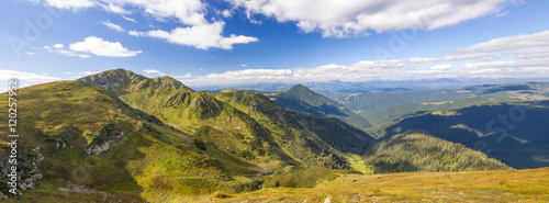Panorama of Carpathian mountains in summer sunny day photo