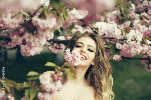 Happy woman in blossom © Volodymyr