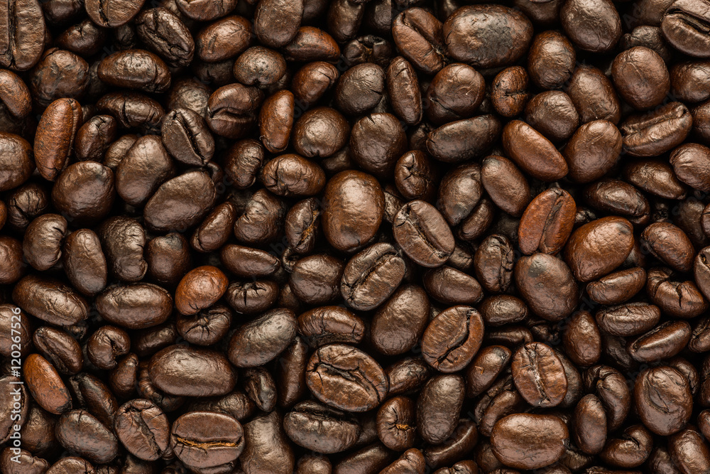 Naklejka premium background of brown coffee beans