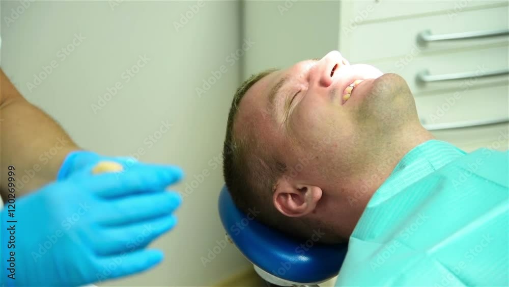 Dentist Prepares Material For Removal Of The Imprint Of Jaw Dentist Prepares Material For Removal Of The Imprint Of Jaw