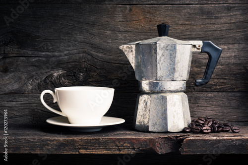 Fotografering still life photography : old espresso maker with coffee beans and white coffee c