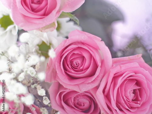 Bouquet of beautiful flowers as a background. Selective focus on pink roses.