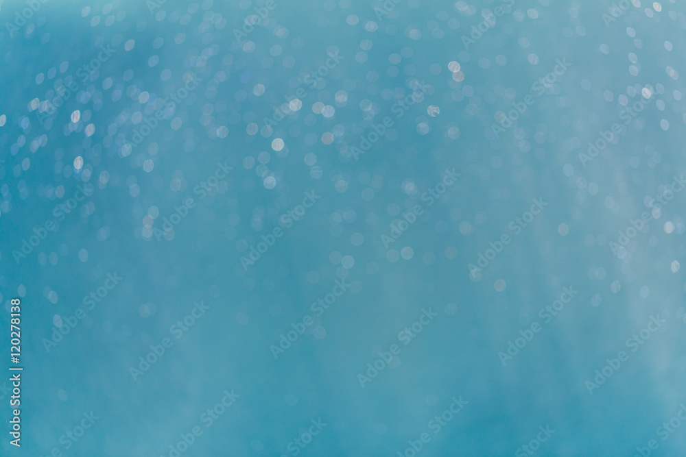 Abstract Light blue bokeh water with light