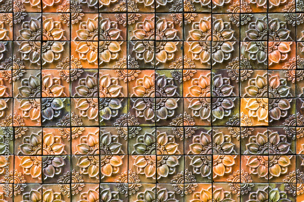 low relief baked clay tile in flower pattern ( traditional made at northeast, Thailand )