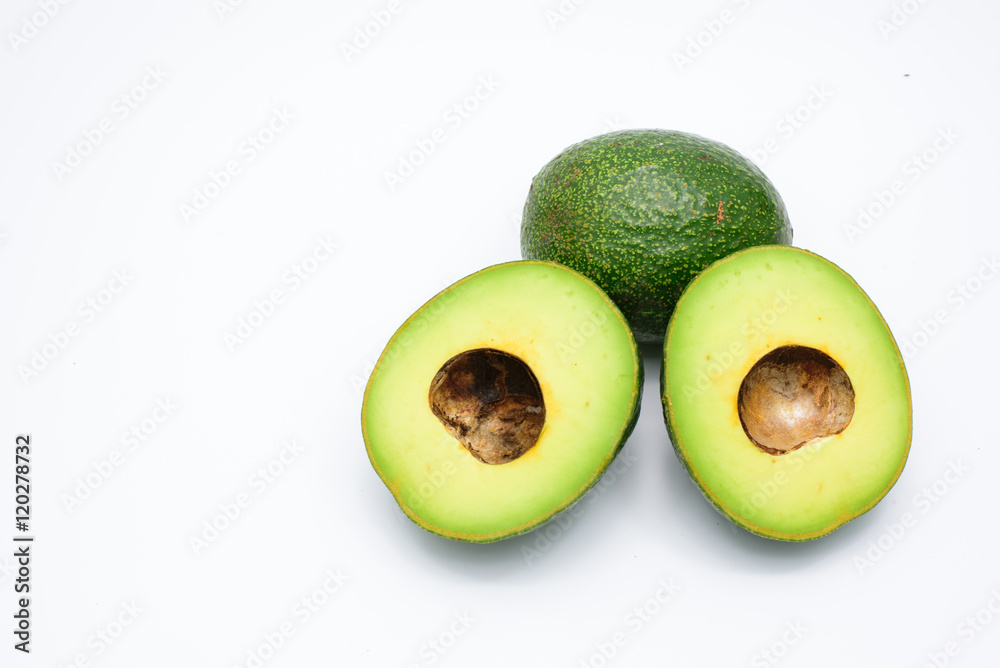 Half of green avocados isolated on a white background
