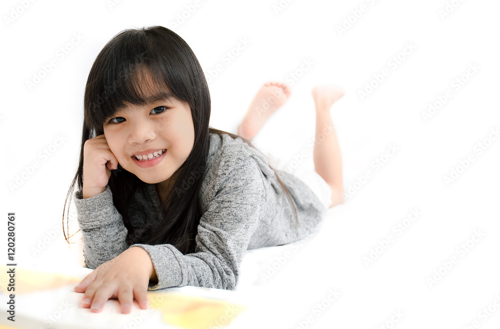 Happy Asian girl reading story book