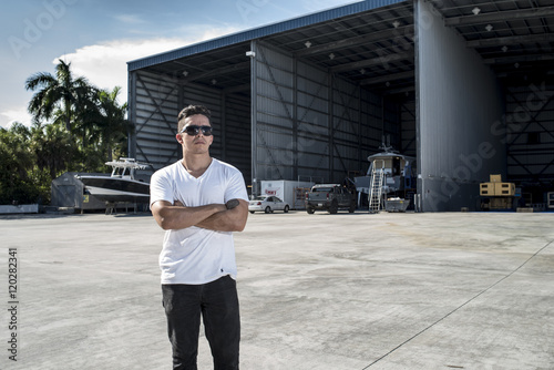 boats designer posing in the shipping company