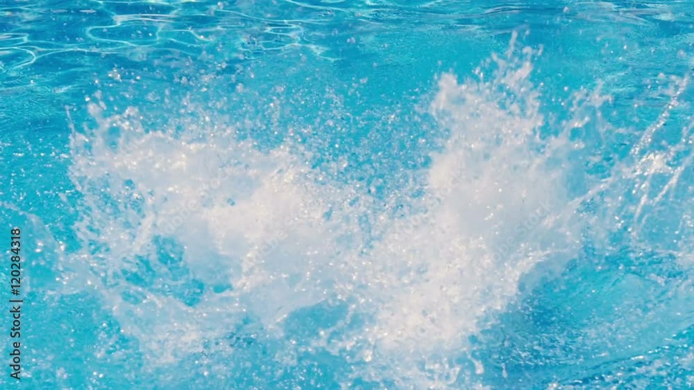 Man jumping in the swimming pool Man jumping in the swimming pool