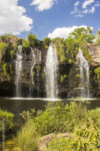 Beautiful stream in sunny day - Waterfall background.