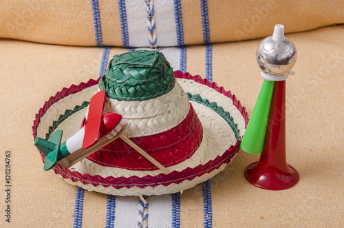 Fotografie Mexican hat, noisemaker and trumpet