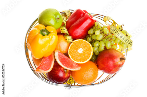 Fototapeta Naklejka Na Ścianę i Meble -  tasty summer fruits in backet isolated on white