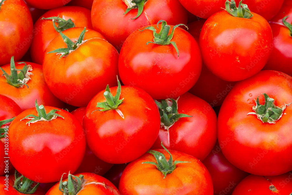 Fresh heirloom tomatoes for sale at a local farmers market Fresh heirloom tomatoes for sale at a local farmers market