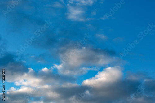 clouds fill the blue sky