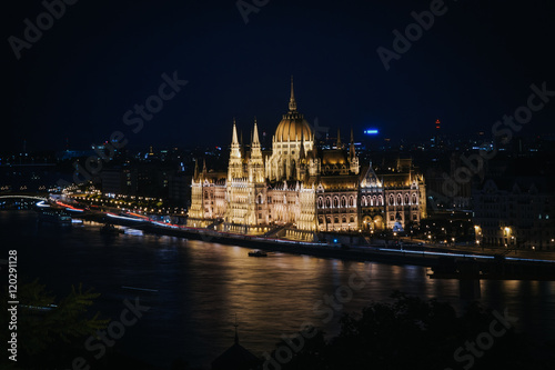 Night view of parliament building, symbol of Budapest © mykolastock