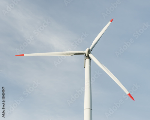 Alternative sources of energy. Windmills against the blue sky