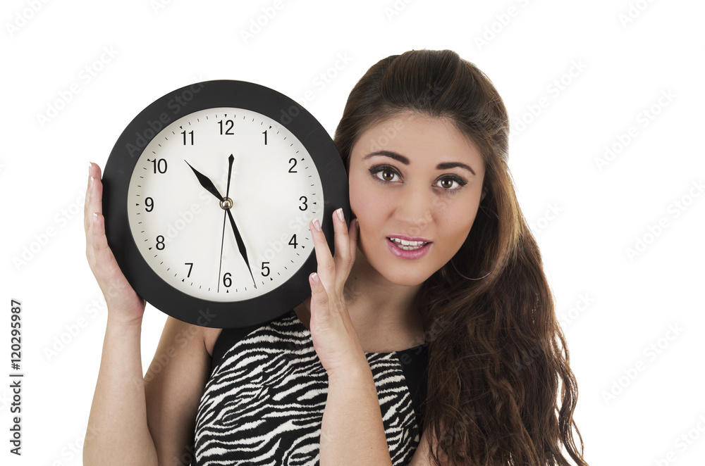 Beautiful young woman holding big round clock Beautiful young woman holding big round clock