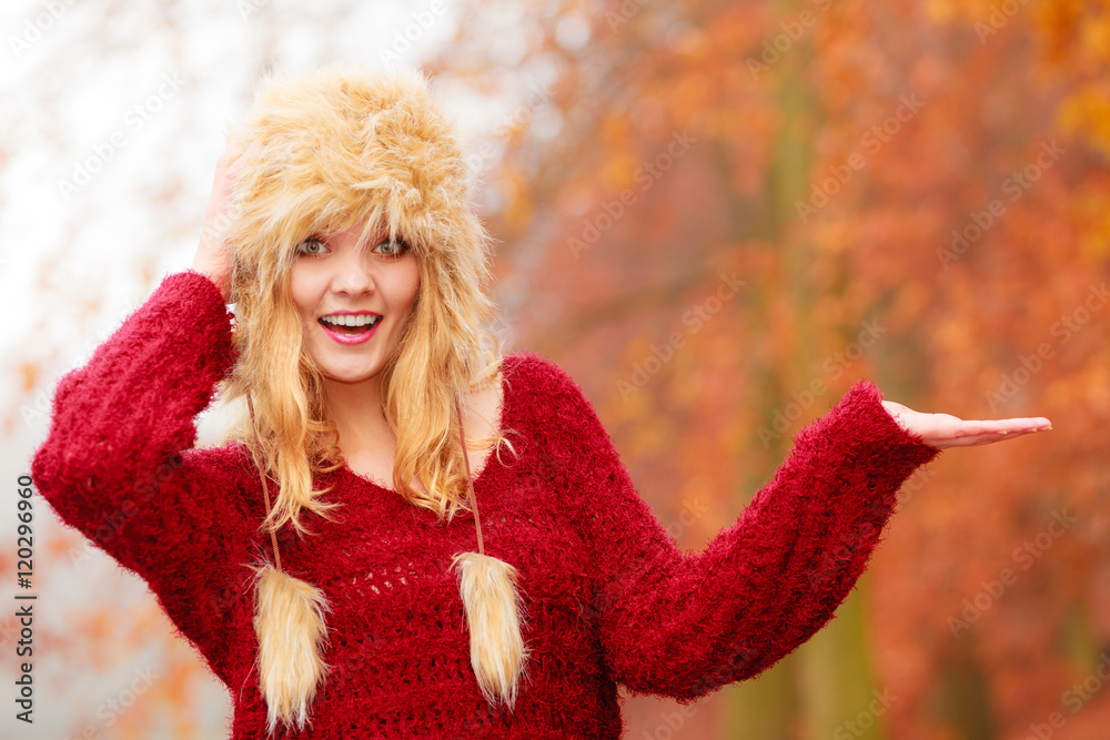 Pretty smiling woman in fur hat with copy space. Pretty smiling woman in fur hat with copy space.