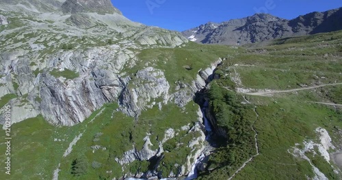 4K Aerial, Flying Above Waterfalls At Rifugio Scarfiotti, Italy - ungraded version photo