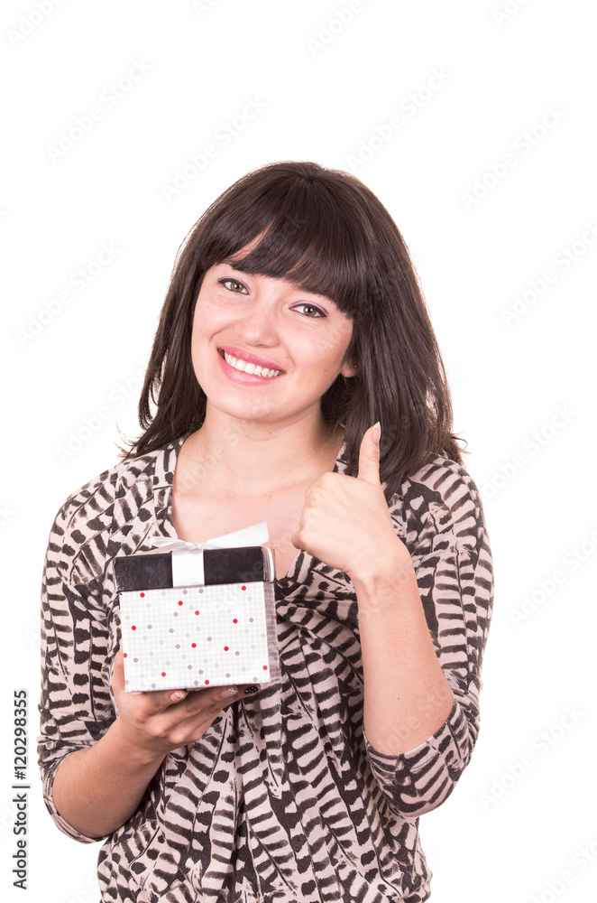 beautiful young happy girl holding present wrapped in a box beautiful young happy girl holding present wrapped in a box