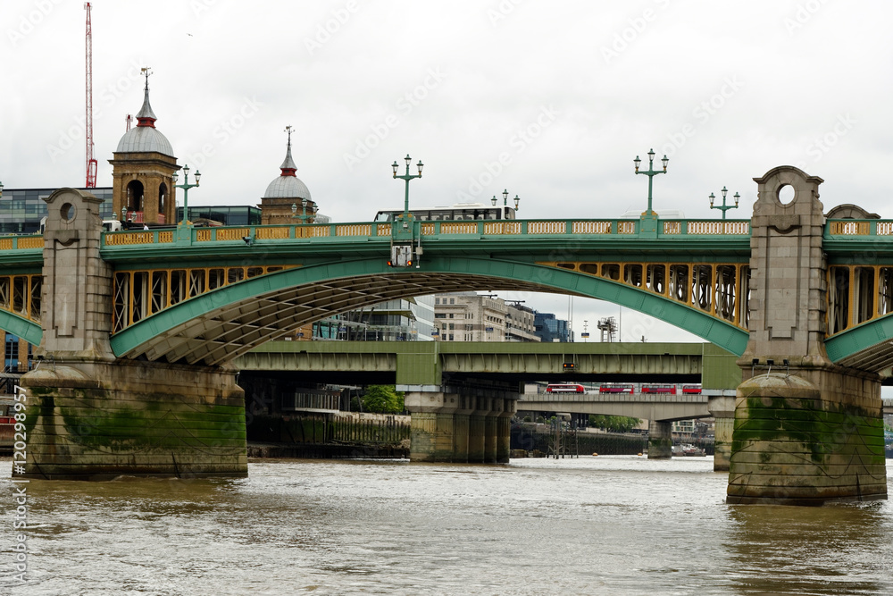 View of Bridges Along the Thames River in London, England. Cannon Street Railway Bridge, London Bridge, Tower Bridge.
