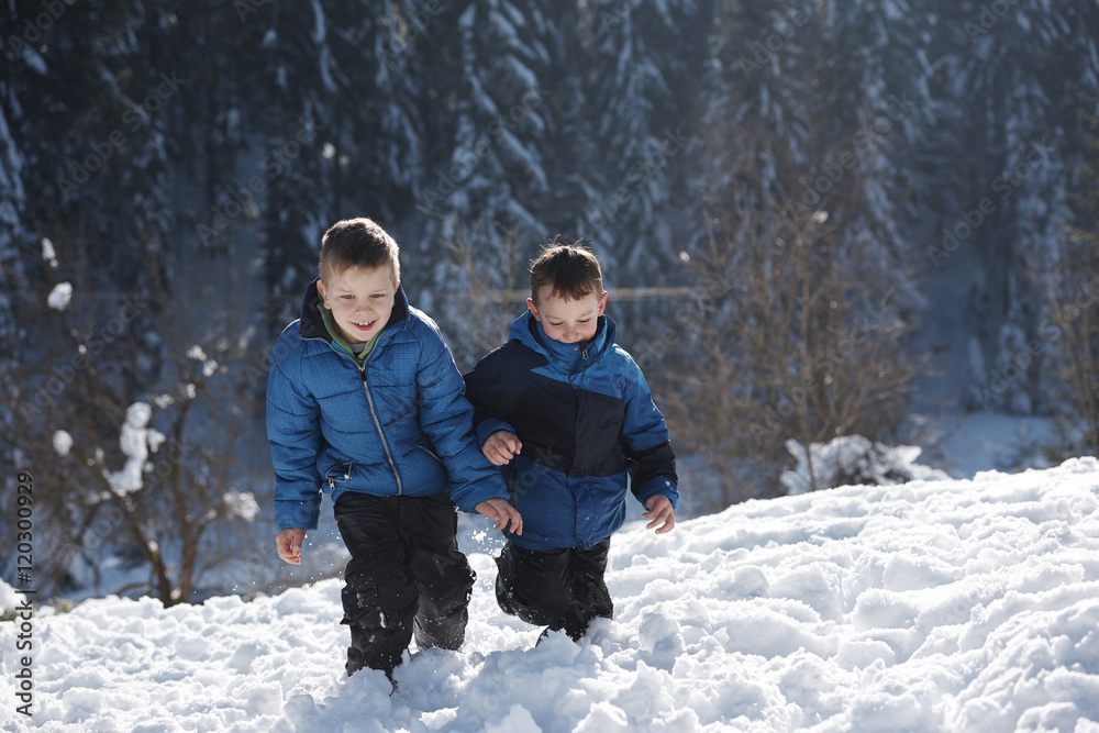 kids playing with  fresh snow