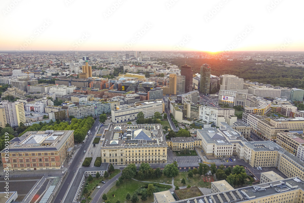 Sunset over the city of Berlin Germany - aerial view