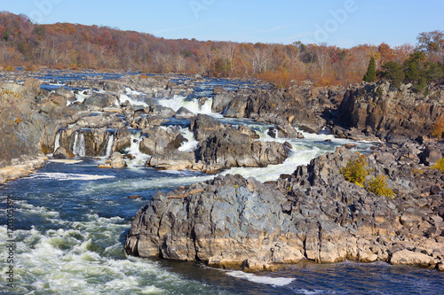 Potomac River waterfalls panorama in Great Falls state park in Virginia, USA. Sunny autumn morning in the state park near the waterfalls. photo