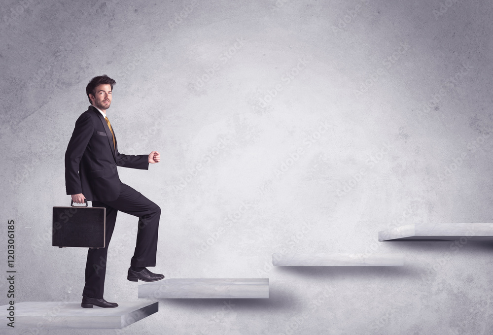 Obraz premium Stepping up a staircase