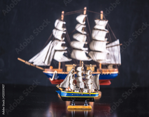 model of a frigate of the 18th century isolated on a black background, pirate ship model