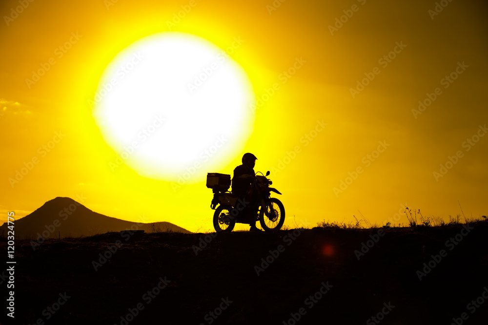 Fototapeta premium silhouette of the mountain motor drive