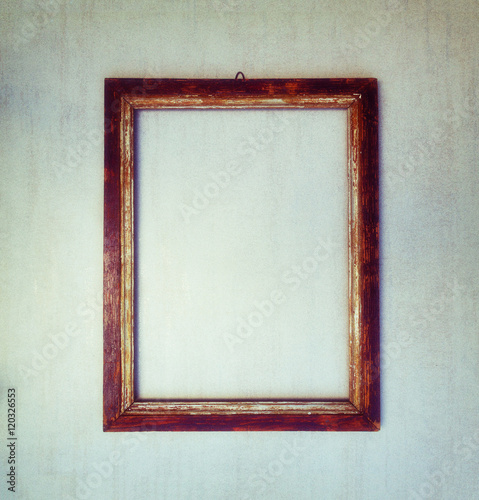 old wooden frame on a gray grunge background. toned image