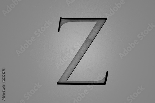 Engraved letter Z on stone background, 3d illustration