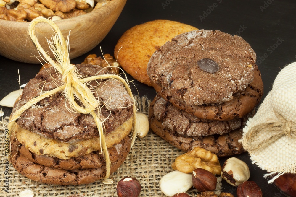 Fototapeta premium Mixed Cookies on wooden table. Homemade biscuits for breakfast. Food preparation. 
