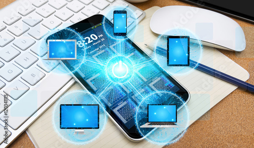 Tech devices connected to each other by mobile phone